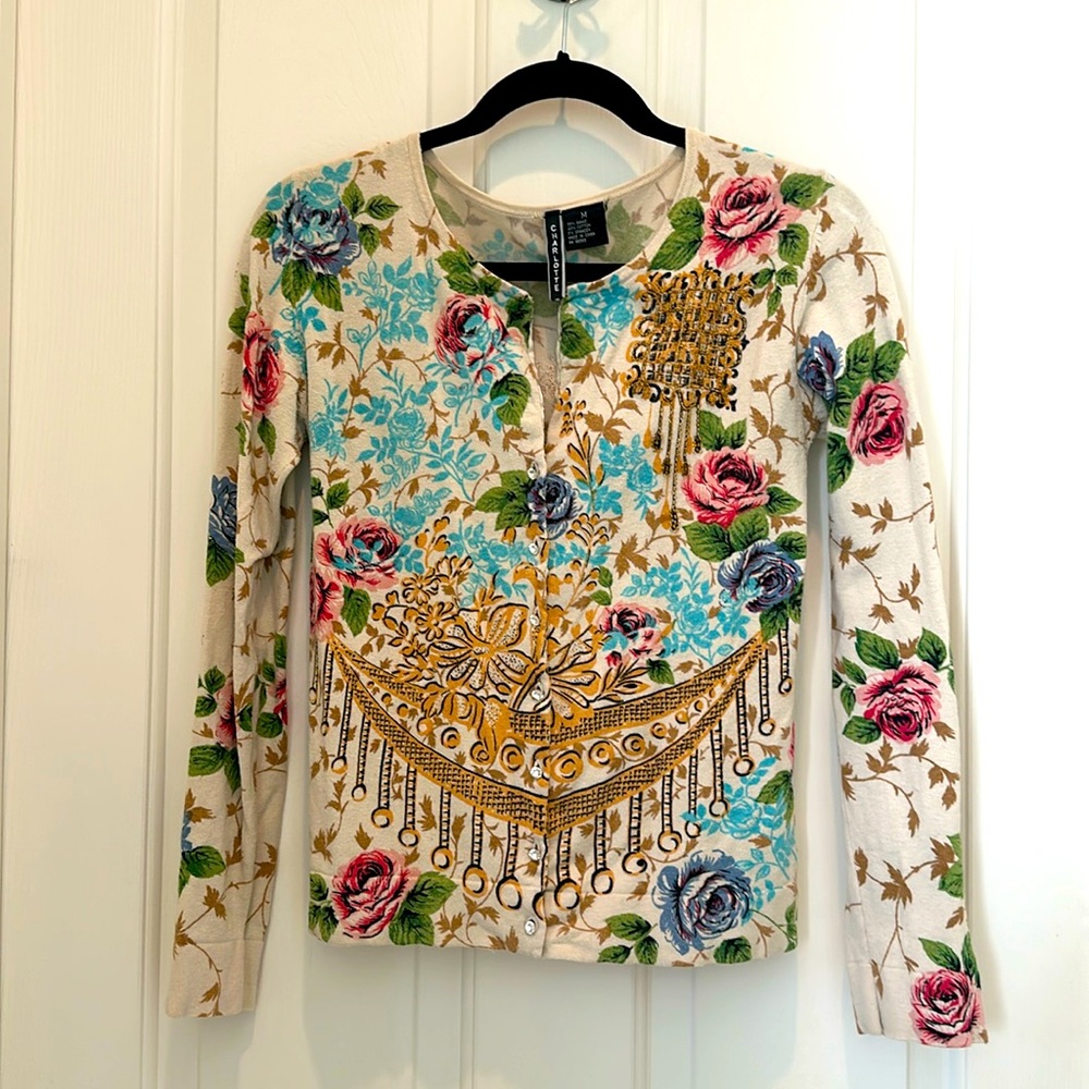 Boutique floral sweater sparkling crystal buttons.
